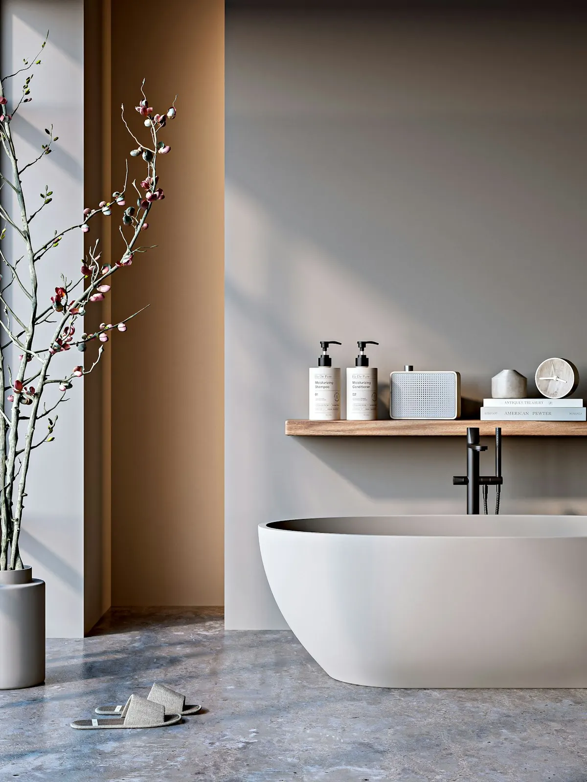 Freestanding bathtub beside a timber shelf holding folded towels and dispensers, lit by soft daylight